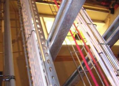 Cable containment rising through a service riser